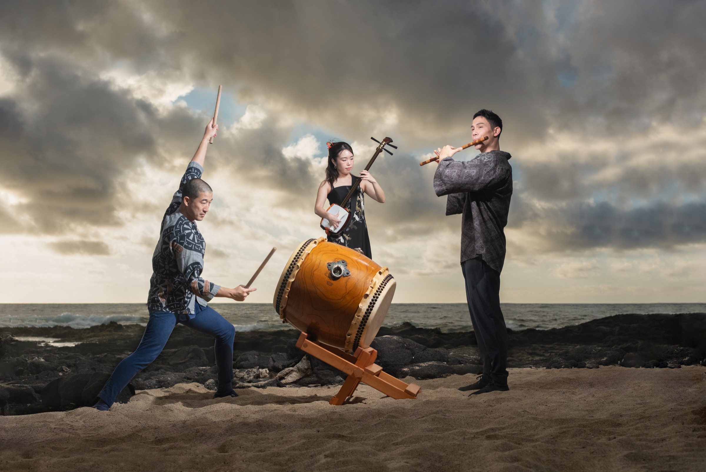 MikAnS members Michael Gonhata, Anju Madoka, and Sho’on Shibata by the ocean